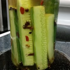 A picture of Home Pickled Cucumbers Are Just Better.