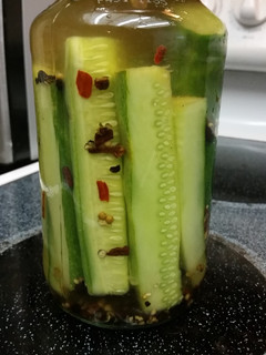 A picture of Home Pickled Cucumbers Are Just Better.