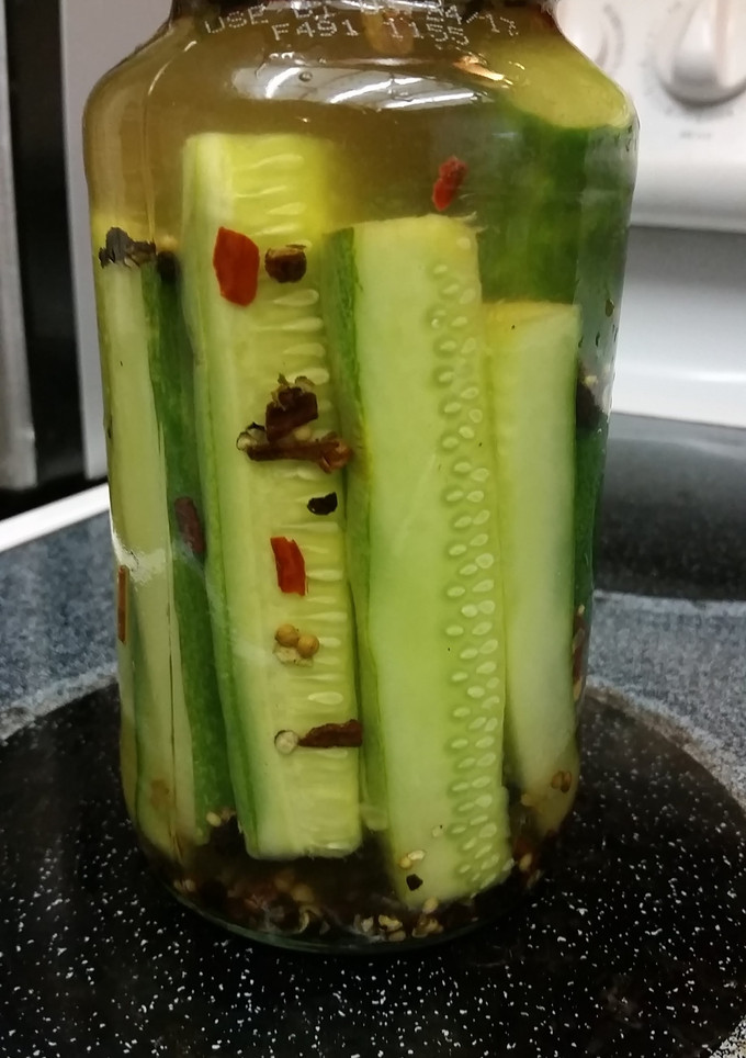 A picture of Home Pickled Cucumbers Are Just Better.