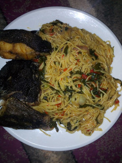A picture of Spaghetti and fish.