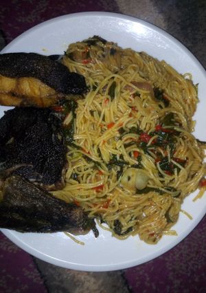 A picture of Spaghetti and fish.