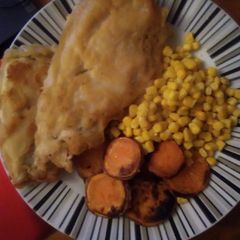 A picture of Homemade cod and fried sweet potato with Sweetcorn.