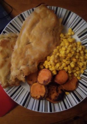A picture of Homemade cod and fried sweet potato with Sweetcorn.