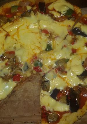 Una foto de Pizzas a la parrilla