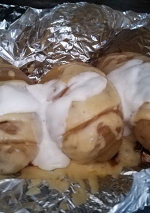 Una foto de Patatas al horno con queso y crema
