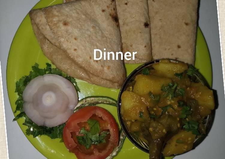 Potato brinjal bhaji chapati and onion tomato salad