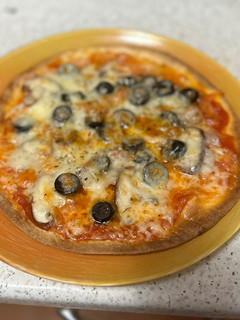 Una foto de Pizza con champiñones