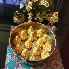 A picture of Besan coconut modak.