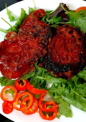 A picture of My Roasted Pork Steaks in My Homemade Gochujang Sauce 💜.
