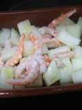 Melón con gambitas saladas