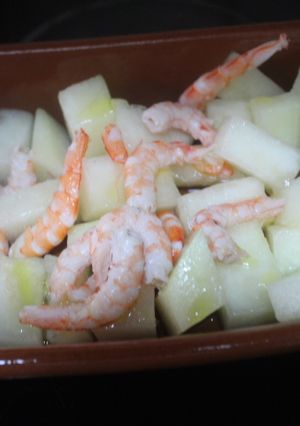 Una foto de Melón con gambitas saladas