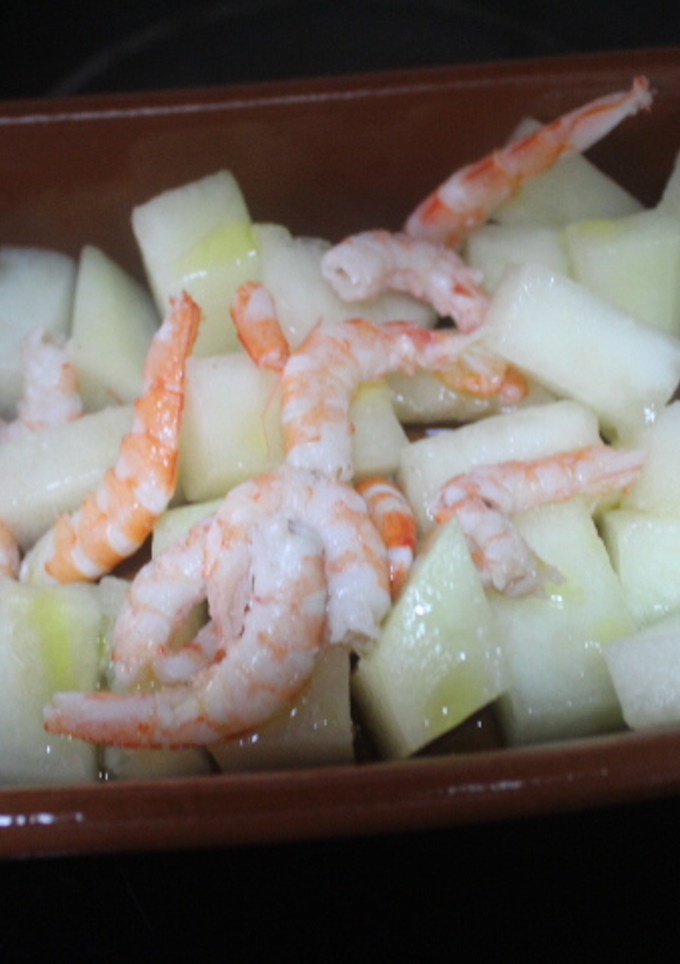 Una foto de Melón con gambitas saladas