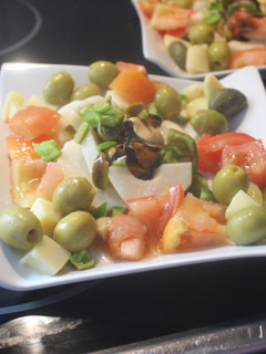 Una foto de Ensalada de mejillones con peras