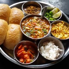 A picture of Spicy sprouted misal pav.