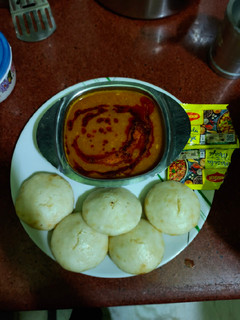 A picture of Idli sambar.
