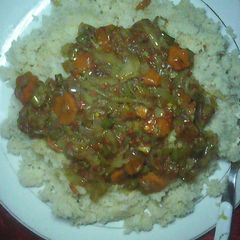 A picture of Couscous with vegetables soup.
