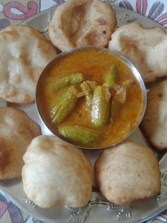 ભરેલા ટીંડોળા નું શાક(bhrela tindalo saak recipe in Gujarati) રેસીપી મુખ્ય ફોટો