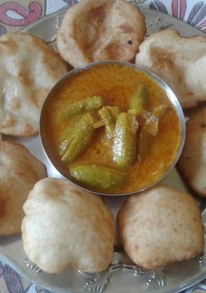ભરેલા ટીંડોળા નું શાક(bhrela tindalo saak recipe in Gujarati) રેસીપી મુખ્ય ફોટો