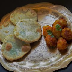 Koraishutir Kochuri o Aloo Dum A picture of Koraishutir Kochuri o Aloo Dum.