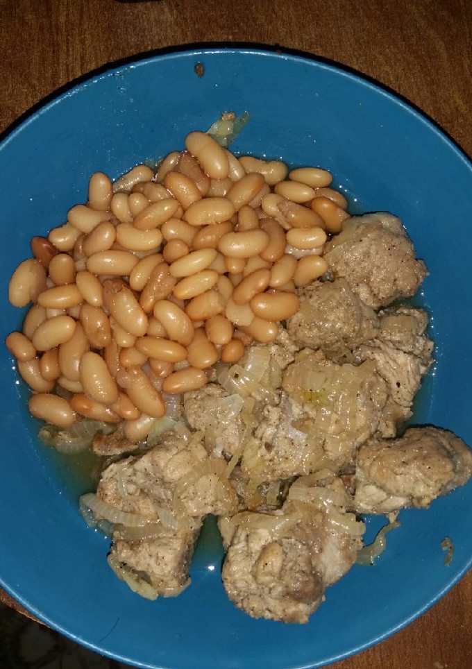 Una foto de Costilla de puerco encebollada fácil y rápido