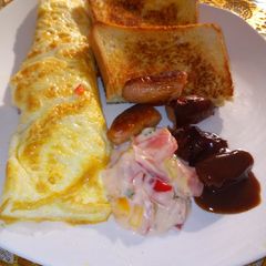A picture of Semi-English breakfast- omelette.