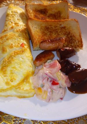 A picture of Semi-English breakfast- omelette.