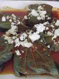 Verduras en molotes  de hojas de hierba santa en caldillo de jitomate