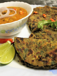 A picture of Kulfa Saag Paratha.