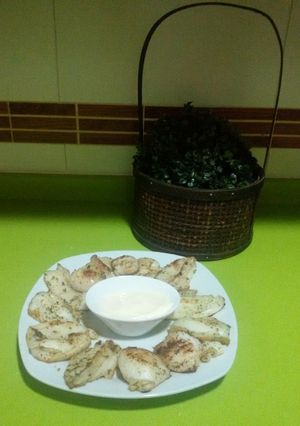 Una foto de Sepia a la plancha al ajillo