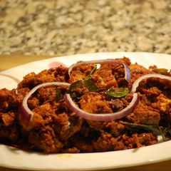 A picture of Chicken Roast/Kozhi Mulaku Perattu.