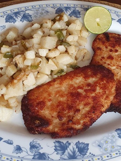Una foto de Milanesa de pollo con queso parmesano