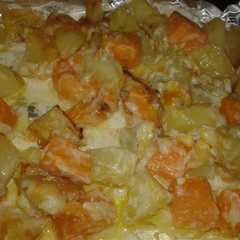 Una foto de Patatas dulces y saladas gratinadas con nata y queso