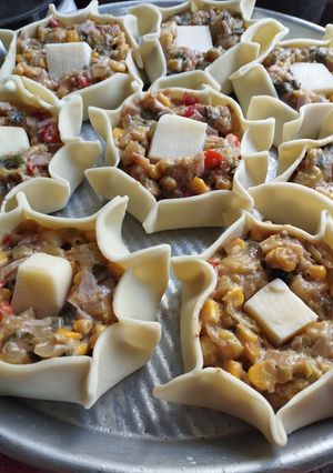 Una foto de Canastitas de Choclo y Salsa Blanca
