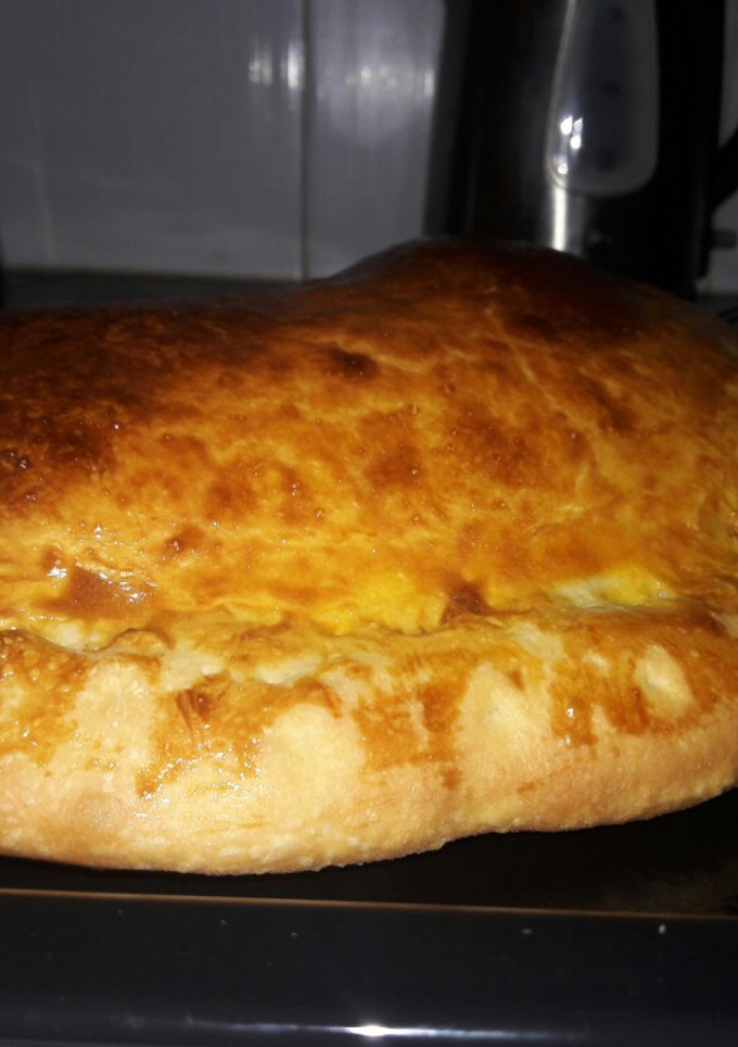 Una foto de Calzone de jamón y muzzarella (masa en Panetera)