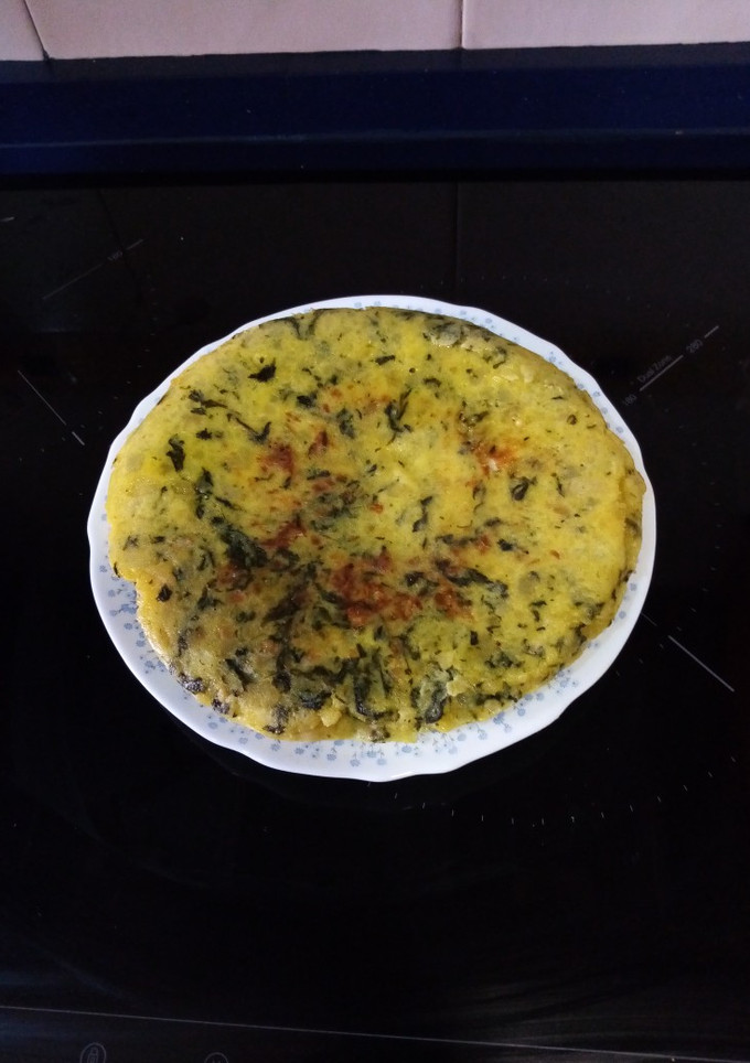 Una foto de Tortilla de patatas y espinacas