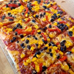 A picture of Vegetarian taco pizza.
