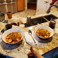 A picture of Mofongo con Camarones en Salsa a la Criolla.