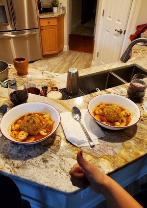 A picture of Mofongo con Camarones en Salsa a la Criolla.