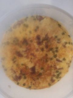 Una foto de Tortilla de Patatas,Yogur y Salchicha