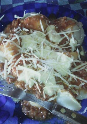 Una foto de Sorrentinos de ricota, queso y jamón