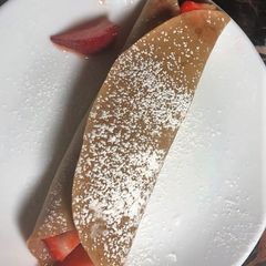 A picture of Chocolate-Almond Crepes with Strawberry Filling.