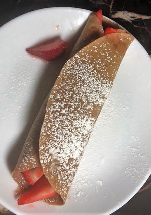 A picture of Chocolate-Almond Crepes with Strawberry Filling.