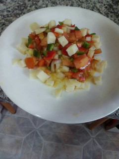 Una foto de Tártar de tomate con queso