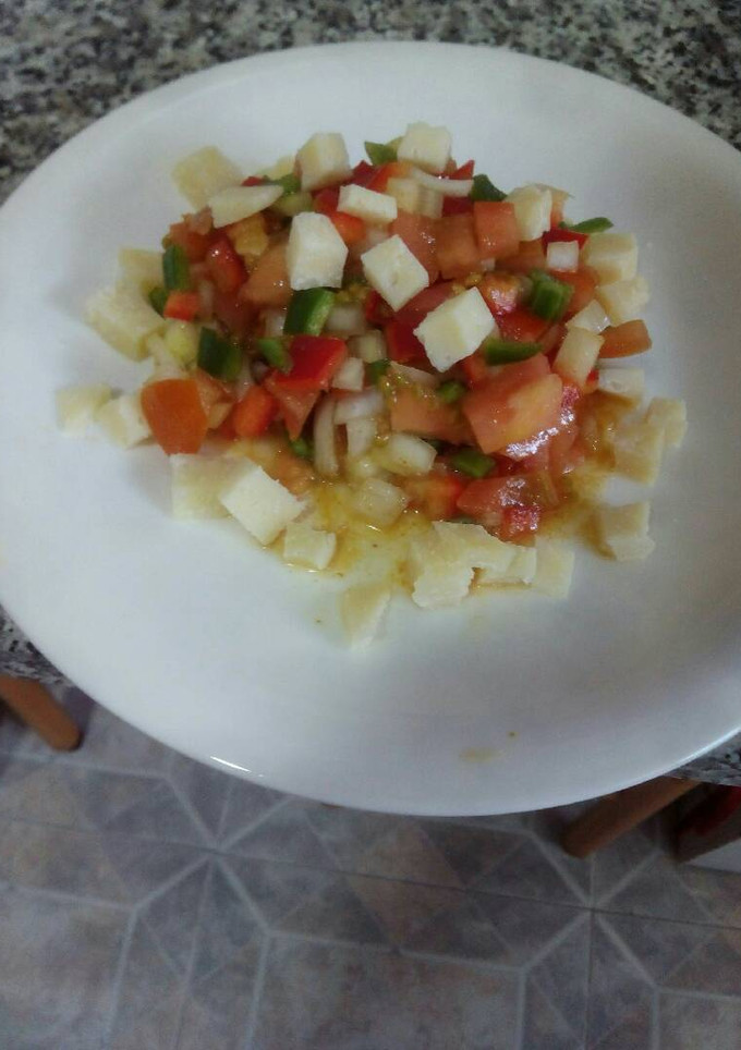 Una foto de Tártar de tomate con queso