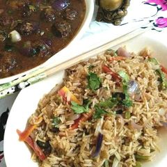 A picture of Veg Fried Rice And Manchurian.