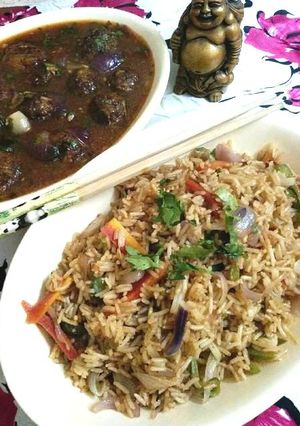 A picture of Veg Fried Rice And Manchurian.