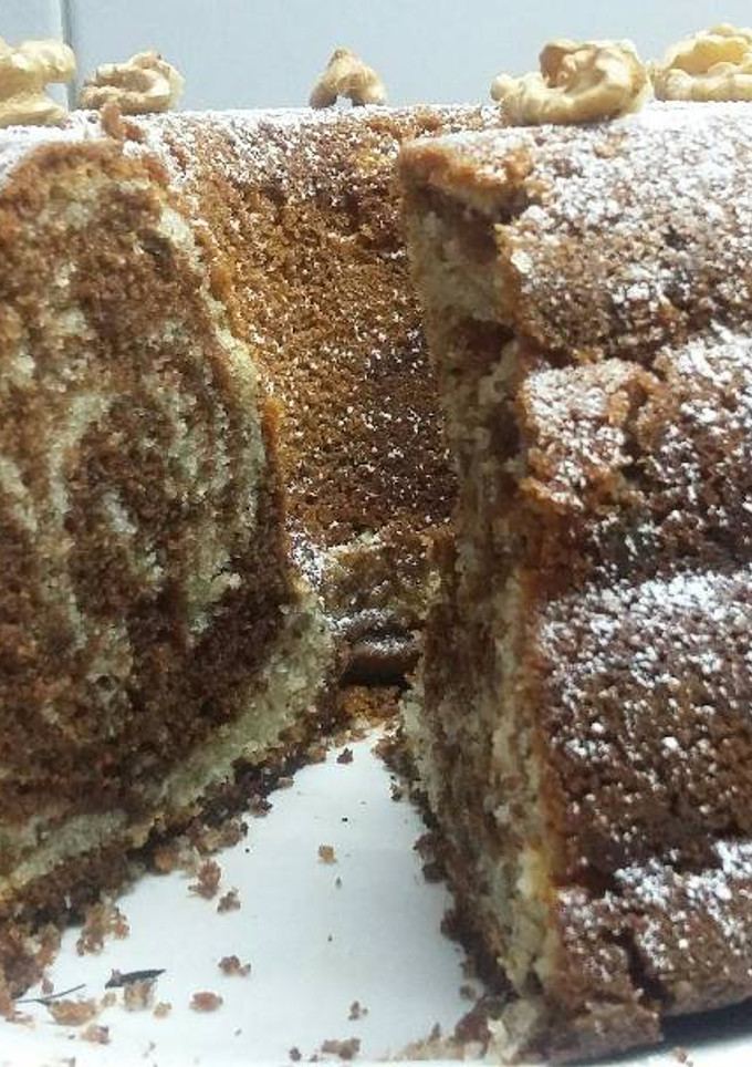 Una foto de Budín marmolado con nueces 💦infaltable en tardes de lluvia💦