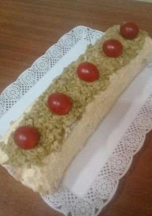 Una foto de Arrollado de jamón y queso