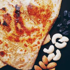 A picture of Caramalized Rich dry fruit parathas.