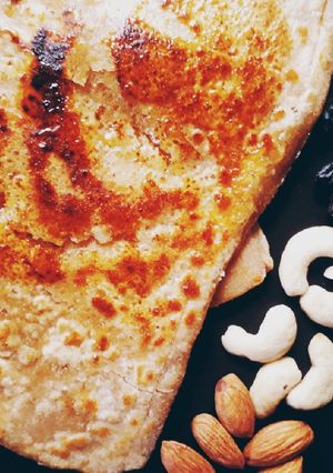 A picture of Caramalized Rich dry fruit parathas.